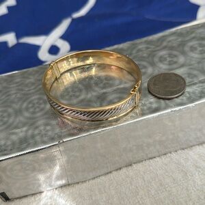 Beautiful 2 tone color of solid 14 kt gold bracelet, not flimsy